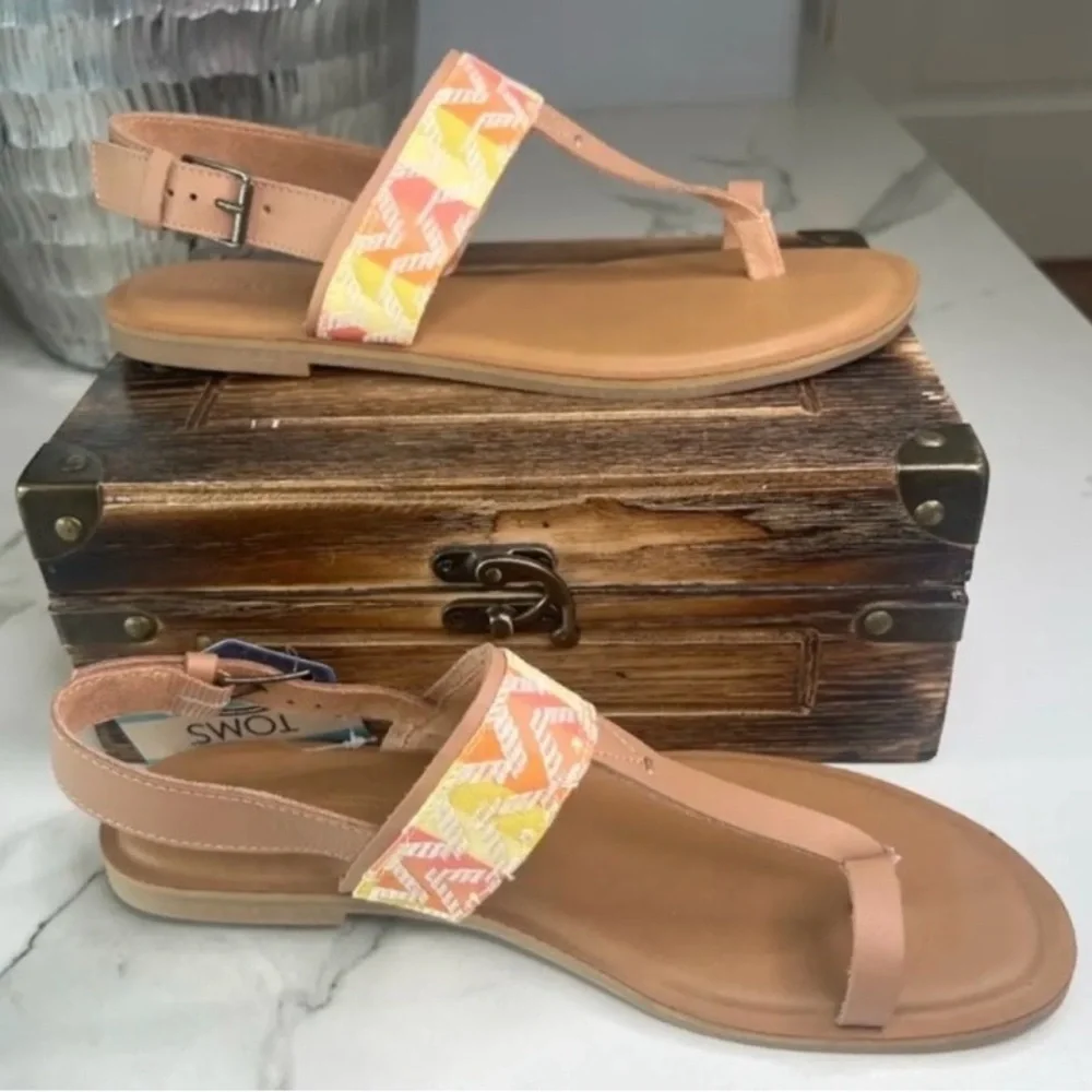 Toms step out